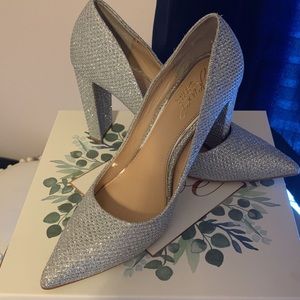 Silver high heeled shoes